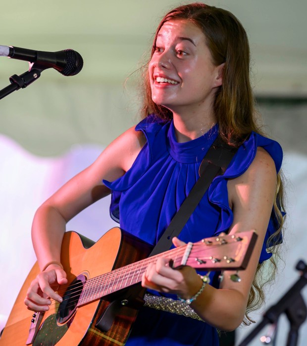 Adeline Csontos, 17, of Fogelsville performs Saturday, July 18, 2026, during Bethlehem Blueberry Festival, organized by Historic Bethlehem Museums & Sites at Burnside Plantation. The festival offers Colonial demonstrations, activities, vendor tents, blueberry-themed foods and live music. (April Gamiz/The Morning Call)