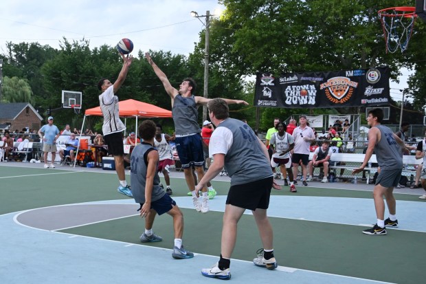 Kyle Parrish shoots the ball during Lower Merion's game against Malvern Prep during the A-Town Throwdown basketball tournament finals Sunday, July 26, 2026, in Cedar Beach in Allentown. (Jon Chiu/The Morning Call)