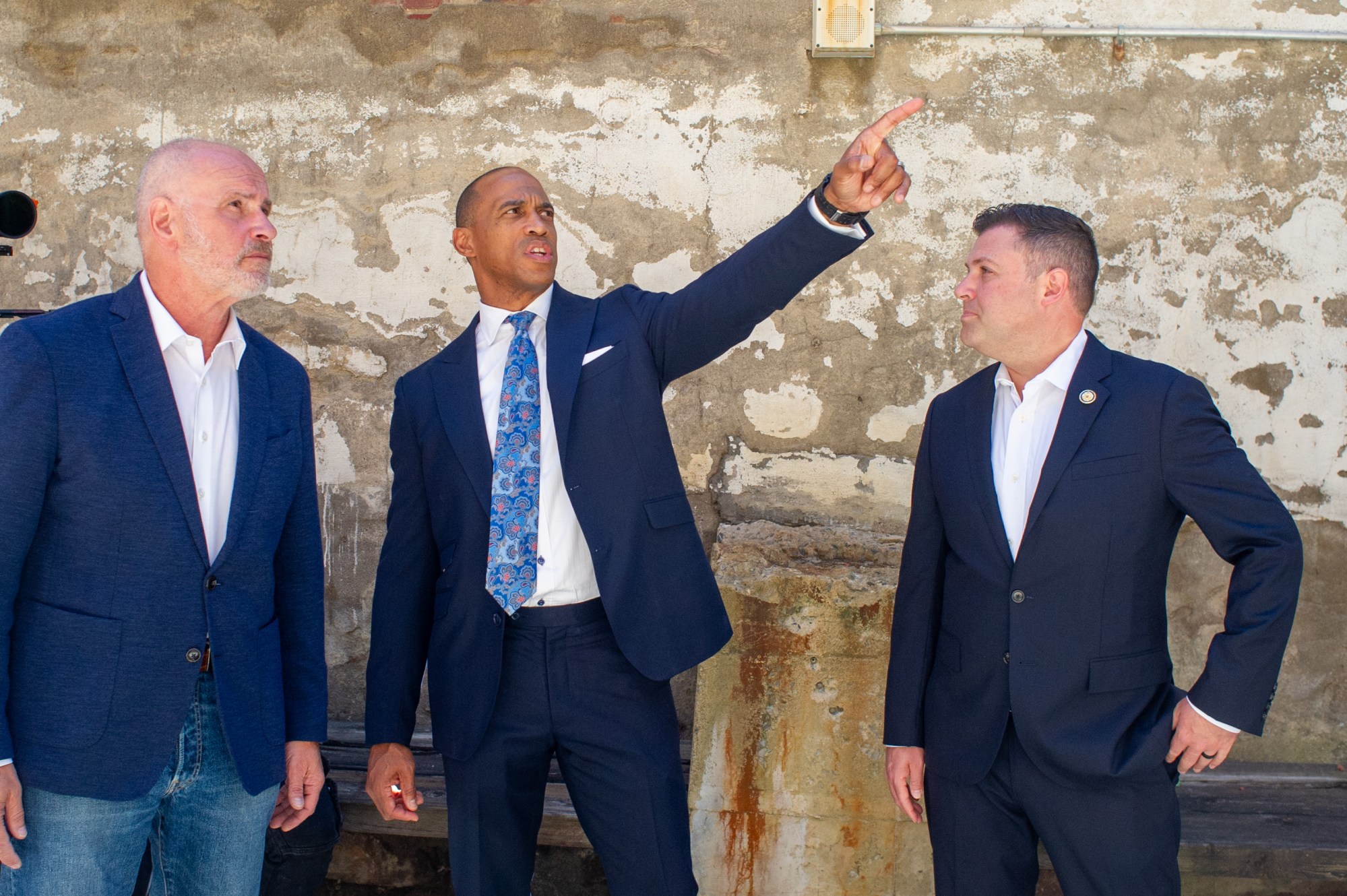 Charlie Jefferson, left, Scott Turner and Ryan Mackenzie tour Adams Street in Bethlehem on Wednesday, July 8, 2026. The visit focused on the U.S. Department of Housing and Urban Development's mission, including opportunity zones, housing affordability and community investment. (Jonathan Broady/Special to The Morning Call)