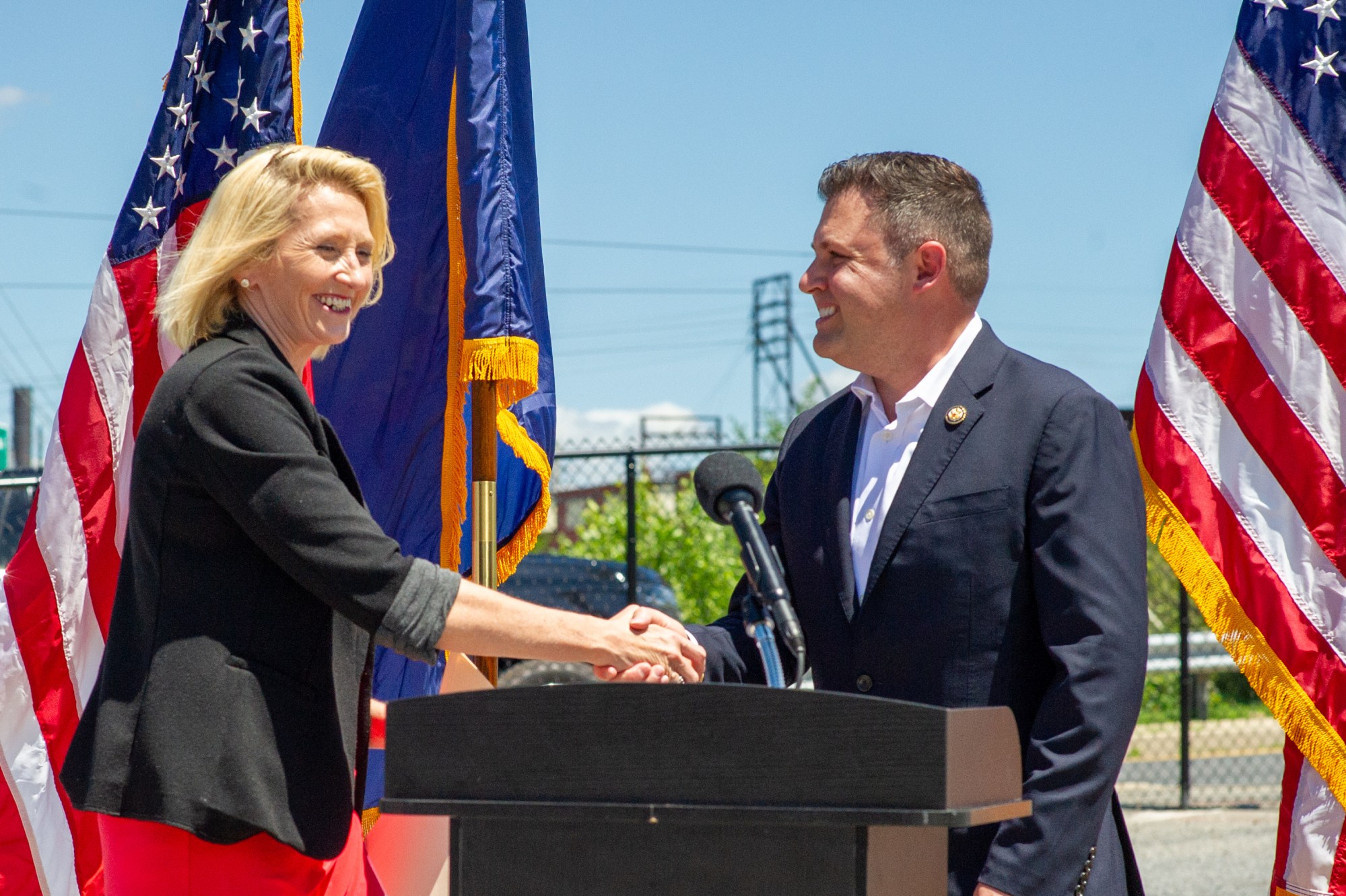 U.S. Rep. Ryan Mackenzie, R-7th District, shakes hands with Marissa Bankert of Alliance Builders on Wednesday, July 8, 2026, during a visit to Bethlehem by Scott Turner. Turner visited the Lehigh Valley to discuss opportunity zones, housing affordability and community investment. (Jonathan Broady/Special to The Morning Call)