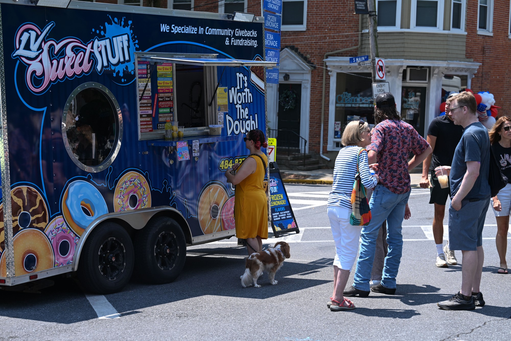 People line up to order from LV Sweet Stuff during the annual Martin on Main street fair Saturday, July 25, 2026, in Nazareth. (Jon Chiu/The Morning Call)