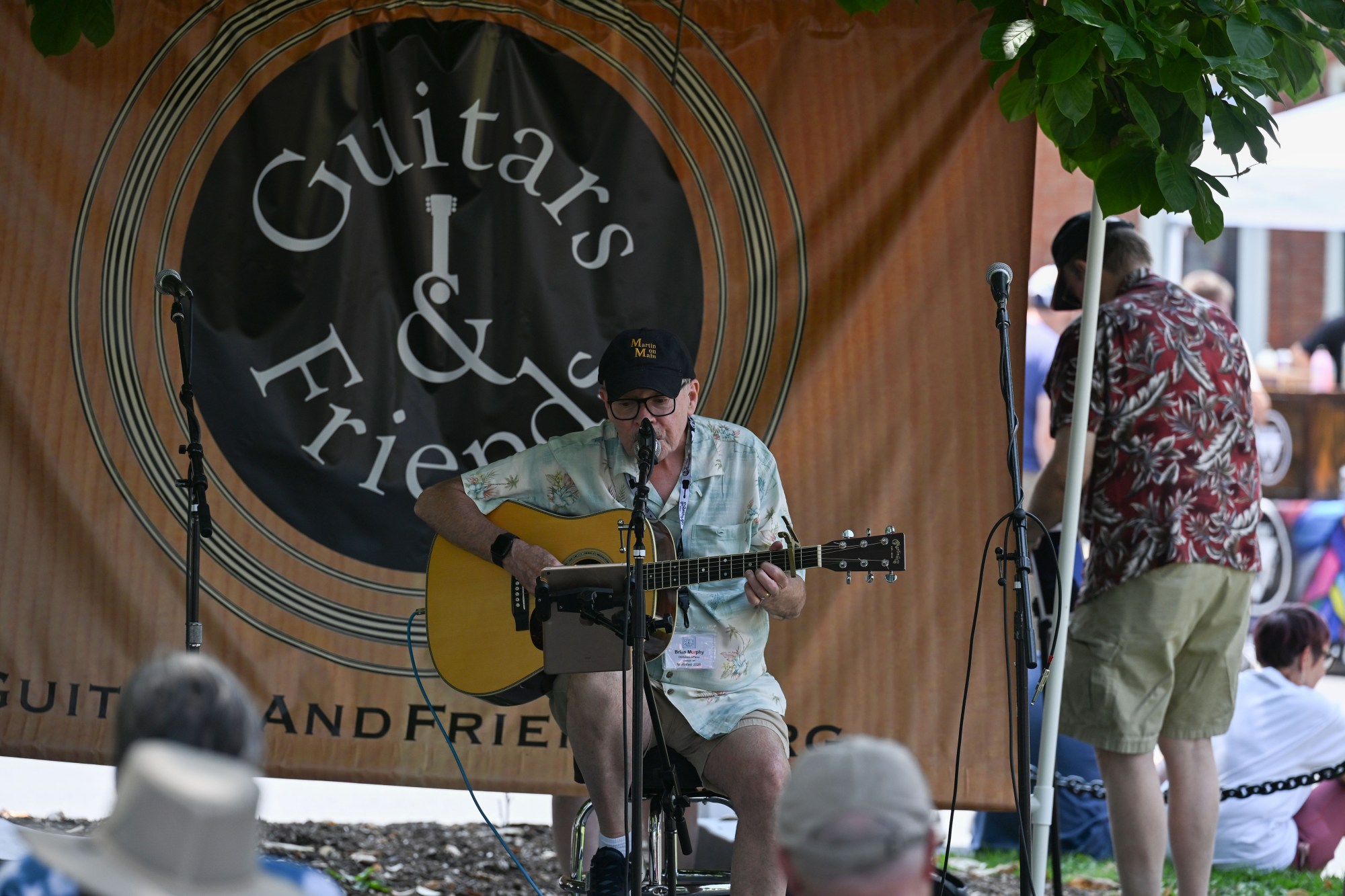 Zeke Carey plays guitar during the annual Martin on Main street fair Saturday, July 25, 2026, in Nazareth. (Jon Chiu/The Morning Call)