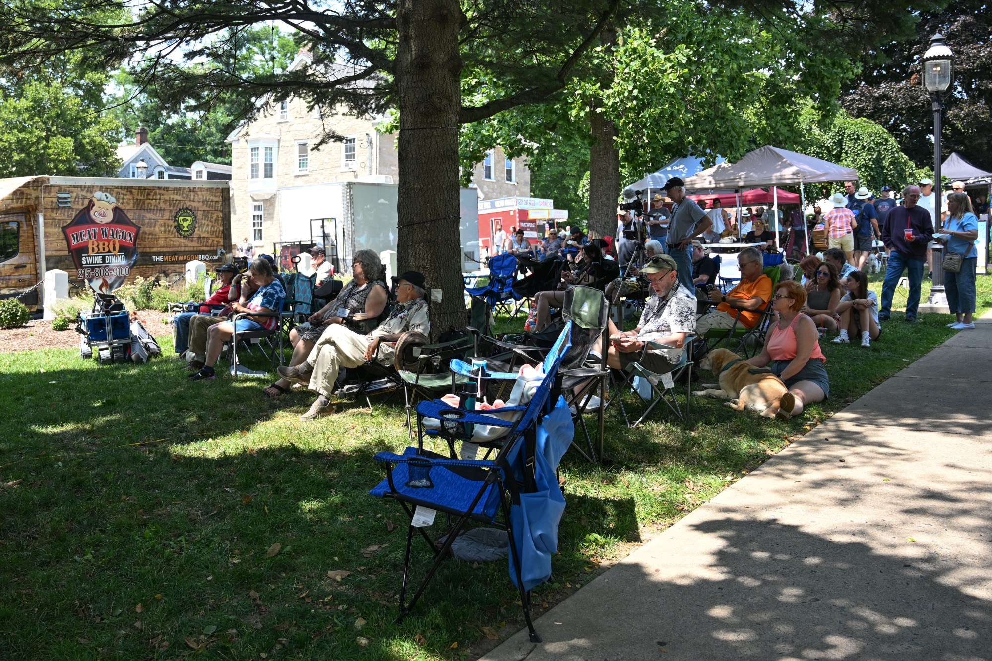 People enjoy live music performances during the annual Martin on Main street fair Saturday, July 25, 2026, in Nazareth. (Jon Chiu/The Morning Call)