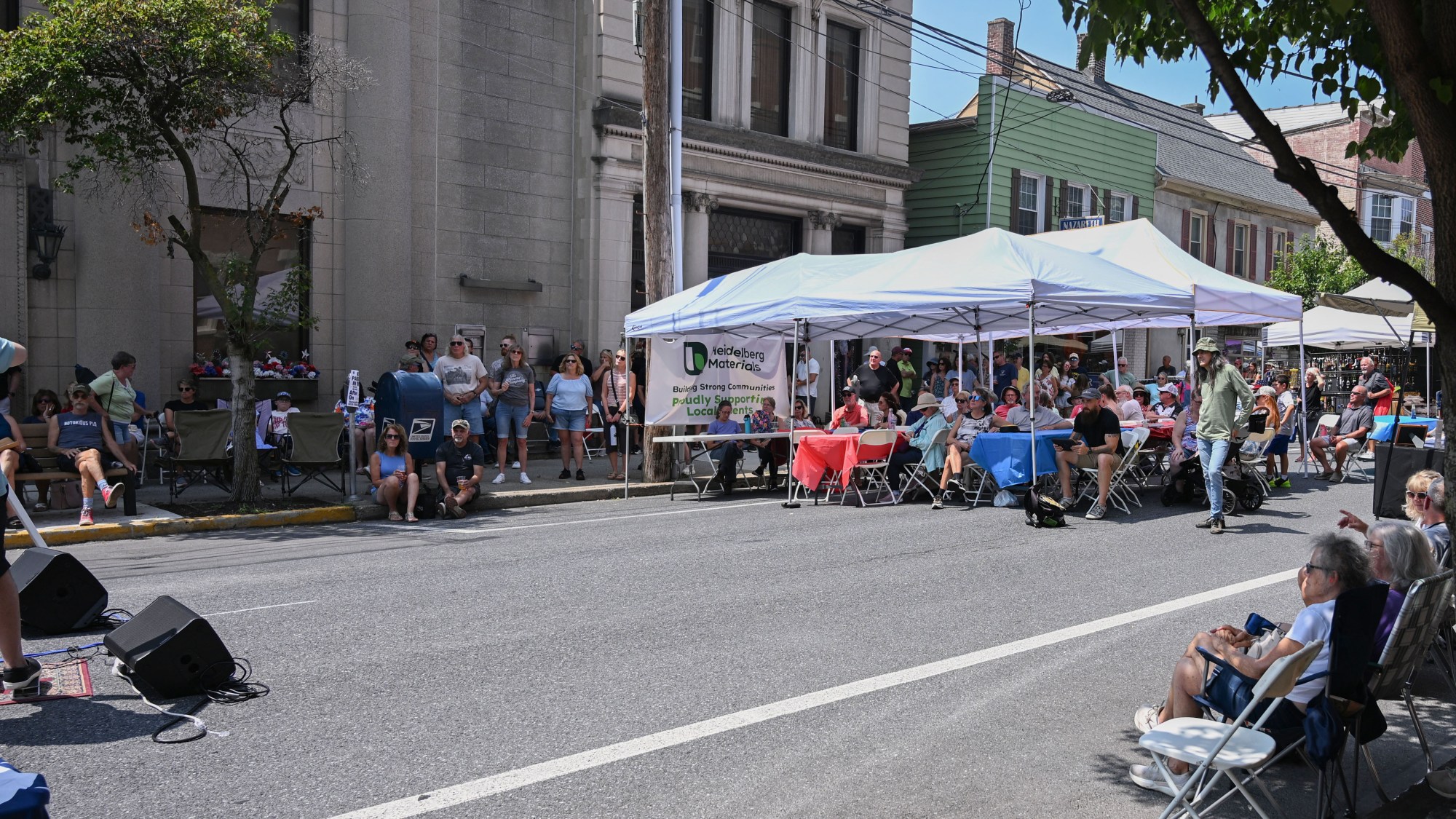 People enjoy live music performances during the annual Martin on Main street fair Saturday, July 25, 2026, in Nazareth. (Jon Chiu/The Morning Call)