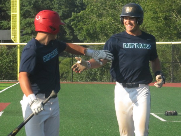 Philadelphia's Aidan Bretschneider, right, celebrates with Tyler Beaulier after hitting a sacrifice fly against Spring-Ford during Game 1 of a Perkiomen Valley Twilight League quarterfinal series, Monday, July 20, 2026. (Ed Morlock/MediaNews Group)