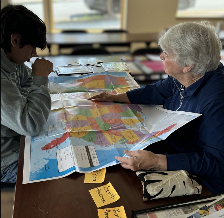 Considering Ignatian Volunteer Corps? Learn About Their Work With United Neighborhood Centers
