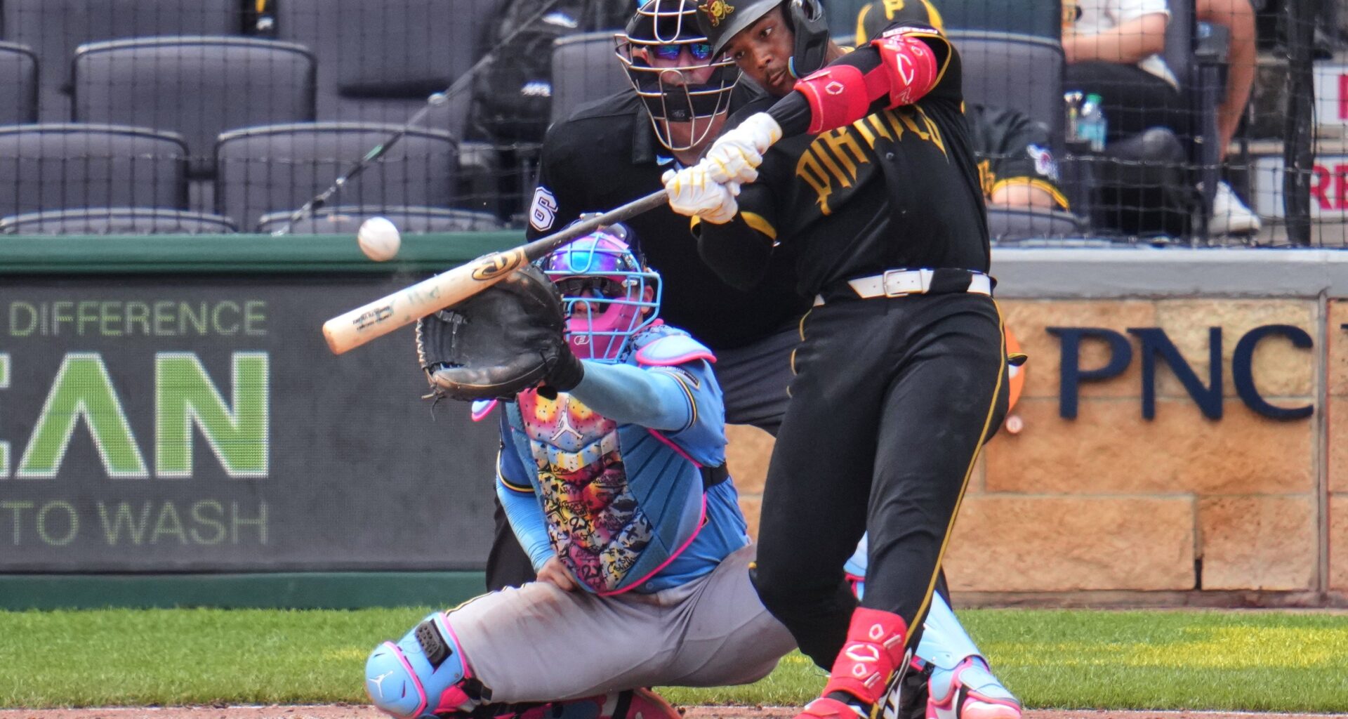 Pittsburgh Pirates' Esmerlyn Valdez hits a grand slam home run off Milwaukee Brewers pitcher Aaron Ashby during the seventh inning of the first game of a baseball double header in Pittsburgh, Saturday, July 11, 2026. (AP Photo/Gene J. Puskar)