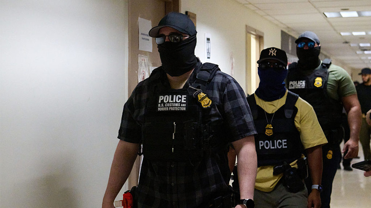 ICE agents wearing masks