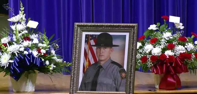 Family, friends, and loved ones gathered this morning at North Schuylkill Junior Senior High School to honor Pennsylvania State Trooper Michael Pahira Jr., who was killed in the line of duty last week during a traffic stop on I-81 in Schuylkill County. family, friends, and loved ones gathered this morning at north schuylkill junior senior high school to honor pennsylvania state trooper michael pahira jr., who was killed in the line of duty last week during a traffic stop on i-81 in schuylkill county.