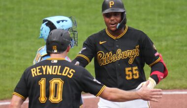 Pittsburgh Pirates' Esmerlyn Valdez (55) celebrates with Bryan Reynolds (10) after hitting a two-run home run off Milwaukee Brewers pitcher Shane Drohan during the fourth inning of the second game of a baseball doubleheader in Pittsburgh, Saturday, July 11, 2026. (AP Photo/Gene J. Puskar)