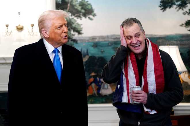 President Trump Meets With Teacher Marc Fogel After Release From Russian Custody WASHINGTON, DC - FEBRUARY 11: U.S. President Donald Trump welcomes Marc Fogel back to the United States after being released from Russian custody, at the White House on February 11, 2025 in Washington, DC. Fogel, a history teacher from Pennsylvania was serving a 14-year prison sentence after being arrested at an airport in Moscow in August 2021 for possessing cannabis, which he reportedly used to treat chronic back pain. He was released earlier today as part of an exchange negotiated by the Trump administration. (Photo by Al Drago/Getty Images)