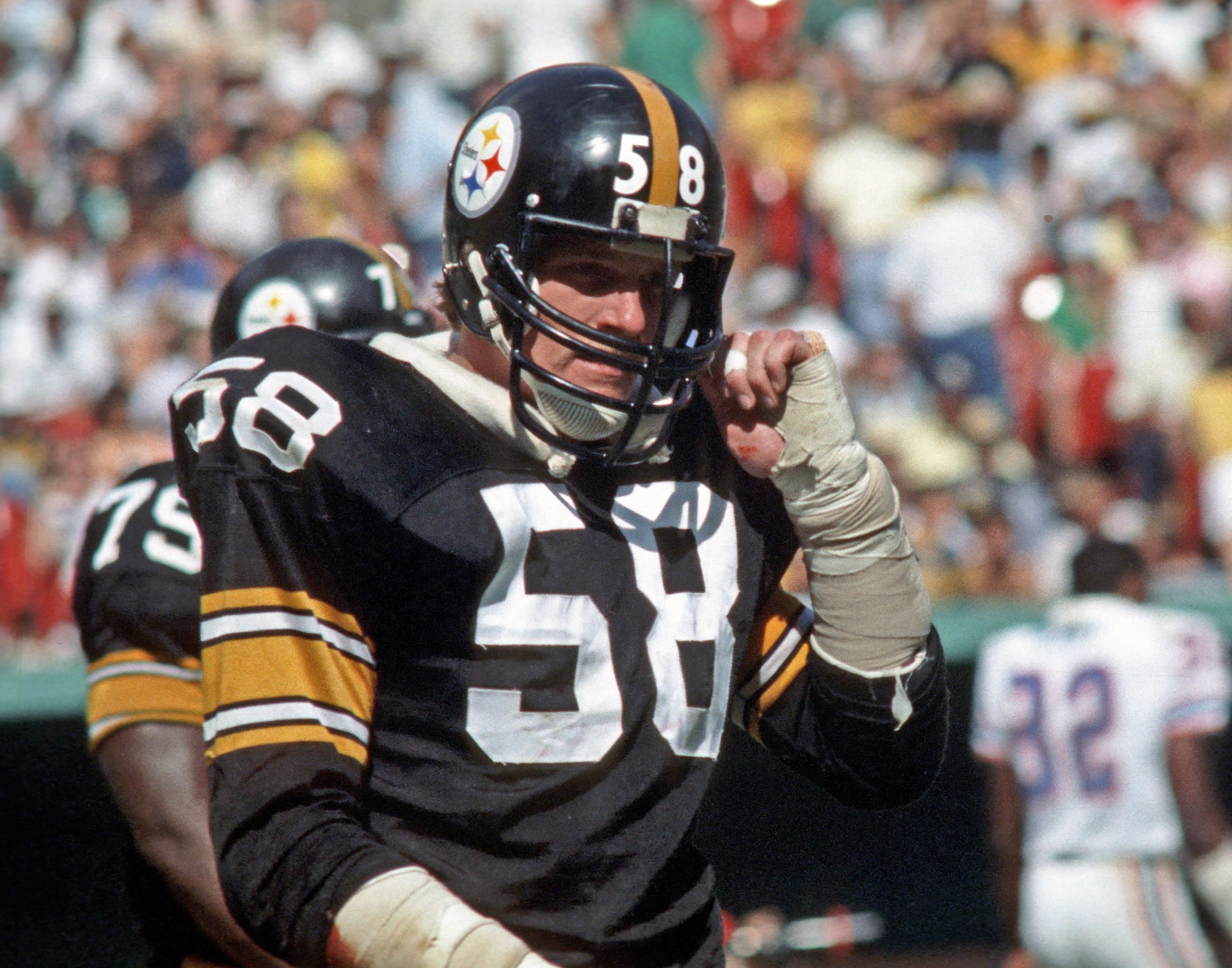 PITTSBURGH, PA - 1982: Linebacker Jack Lambert #58 of the Pittsburgh Steelers looks on from the field during a National Football League game at Three Rivers Stadium in 1982 in Pittsburgh, Pennsylvania. (Photo by George Gojkovich/Getty Images)