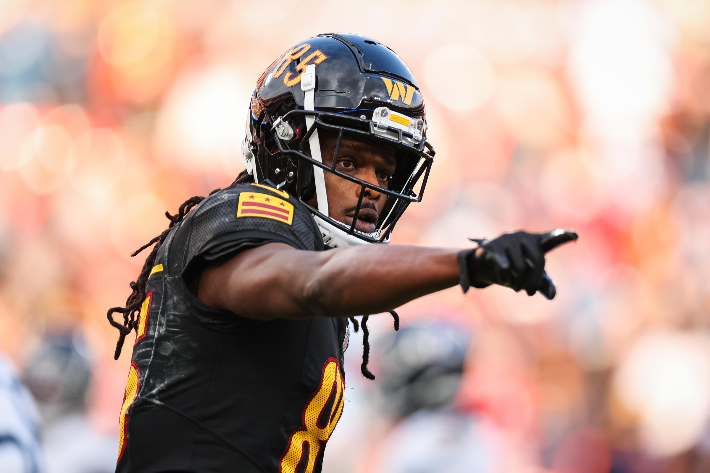 LANDOVER, MD - DECEMBER 01: Noah Brown #85 of the Washington Commanders reacts during the second half of the game against the Tennessee Titans at Northwest Stadium on December 1, 2024 in Landover, Maryland. (Photo by Scott Taetsch/Getty Images)