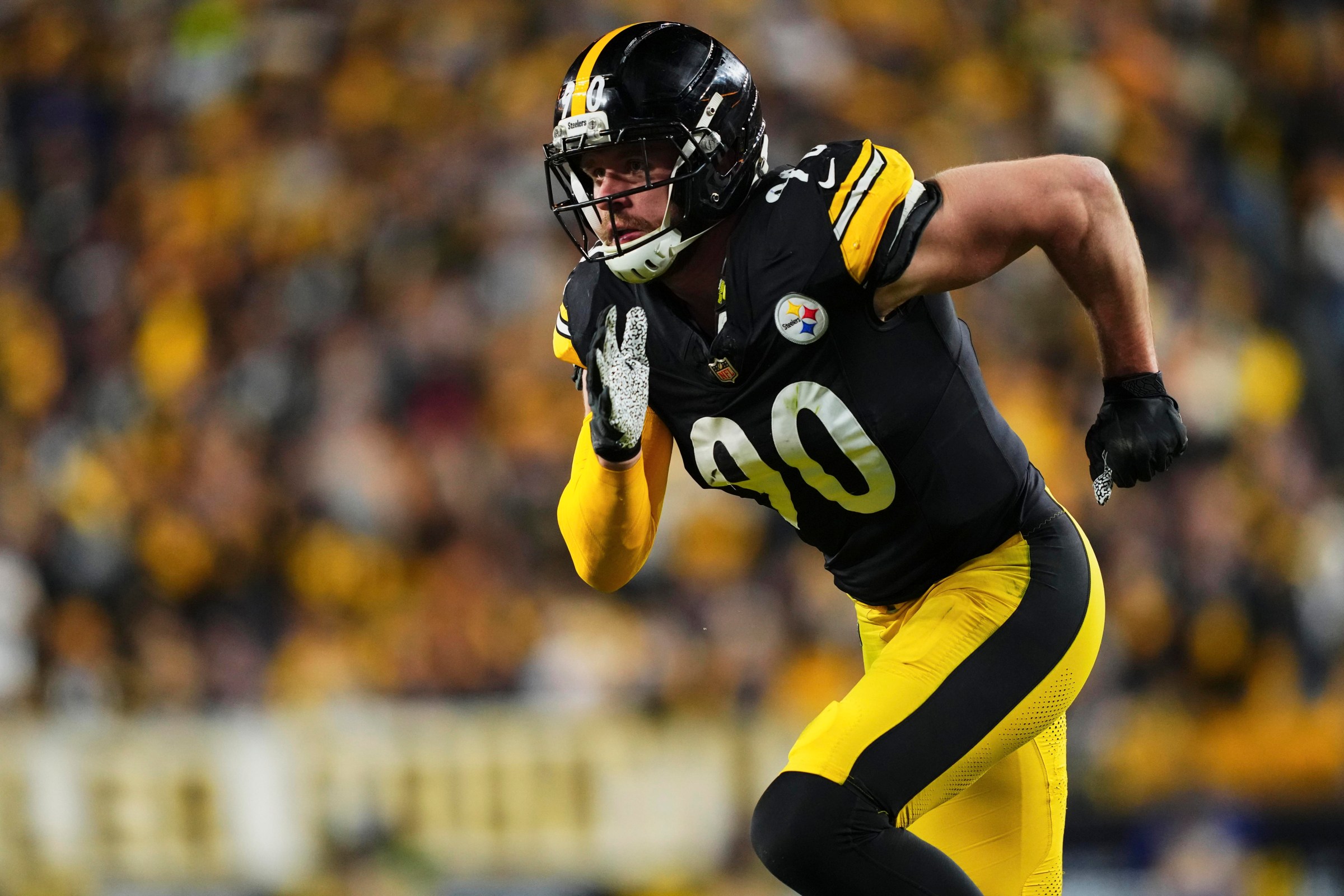 PITTSBURGH, PA - JANUARY 12: T.J. Watt #90 of the Pittsburgh Steelers defends against the Houston Texans during the first half of an AFC Wild Card Playoff game at Acrisure Stadium on January 12, 2026 in Pittsburgh, Pennsylvania. (Photo by Cooper Neill/Getty Images)