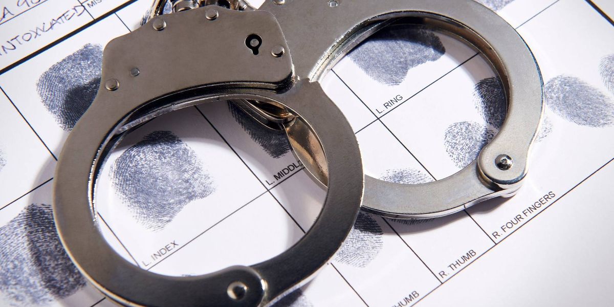 Woman accused of threatening taxi driver with knife