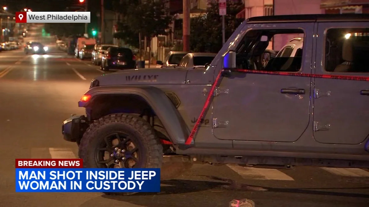 Woman in custody after man shot while inside Jeep in West Philadelphia