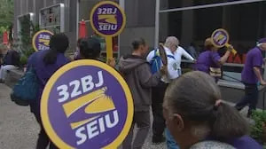 Union members rally in Downtown Pittsburgh, say a building’s janitorial positions were eliminated