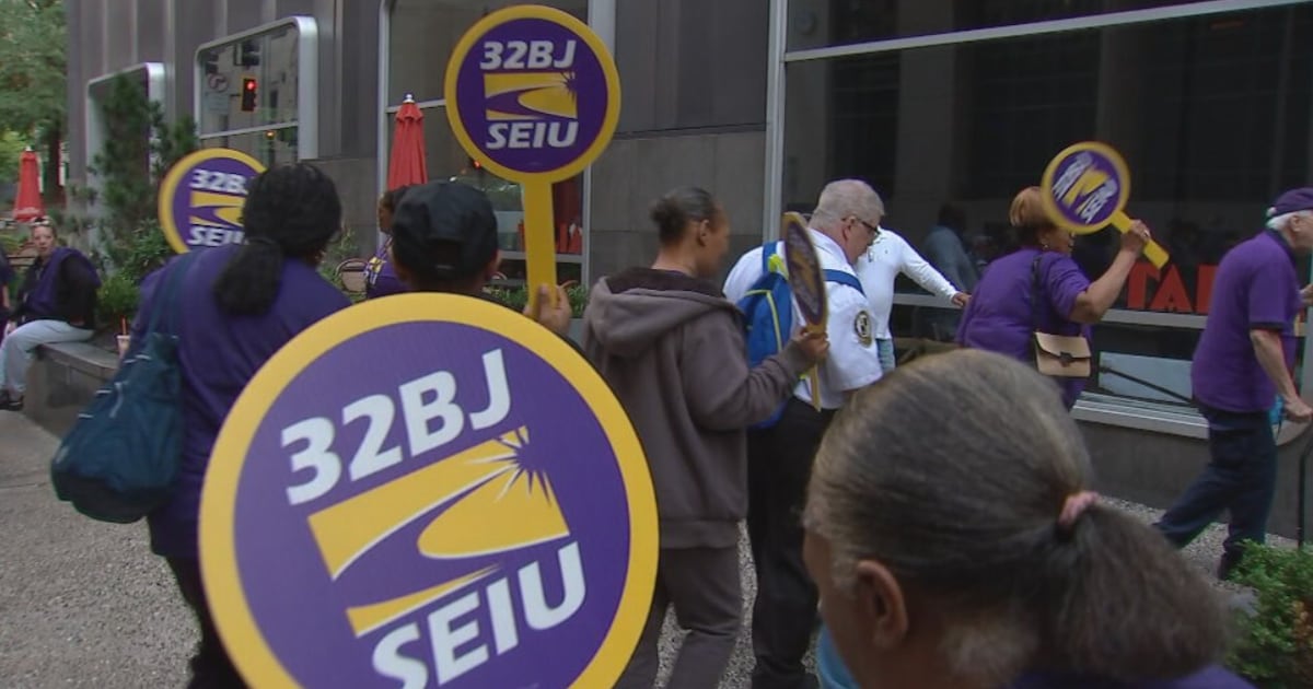 Union members rally in Downtown Pittsburgh, say a building’s janitorial positions were eliminated