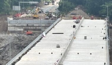 Crews start sliding new Commercial Street Bridge into place on the Parkway East