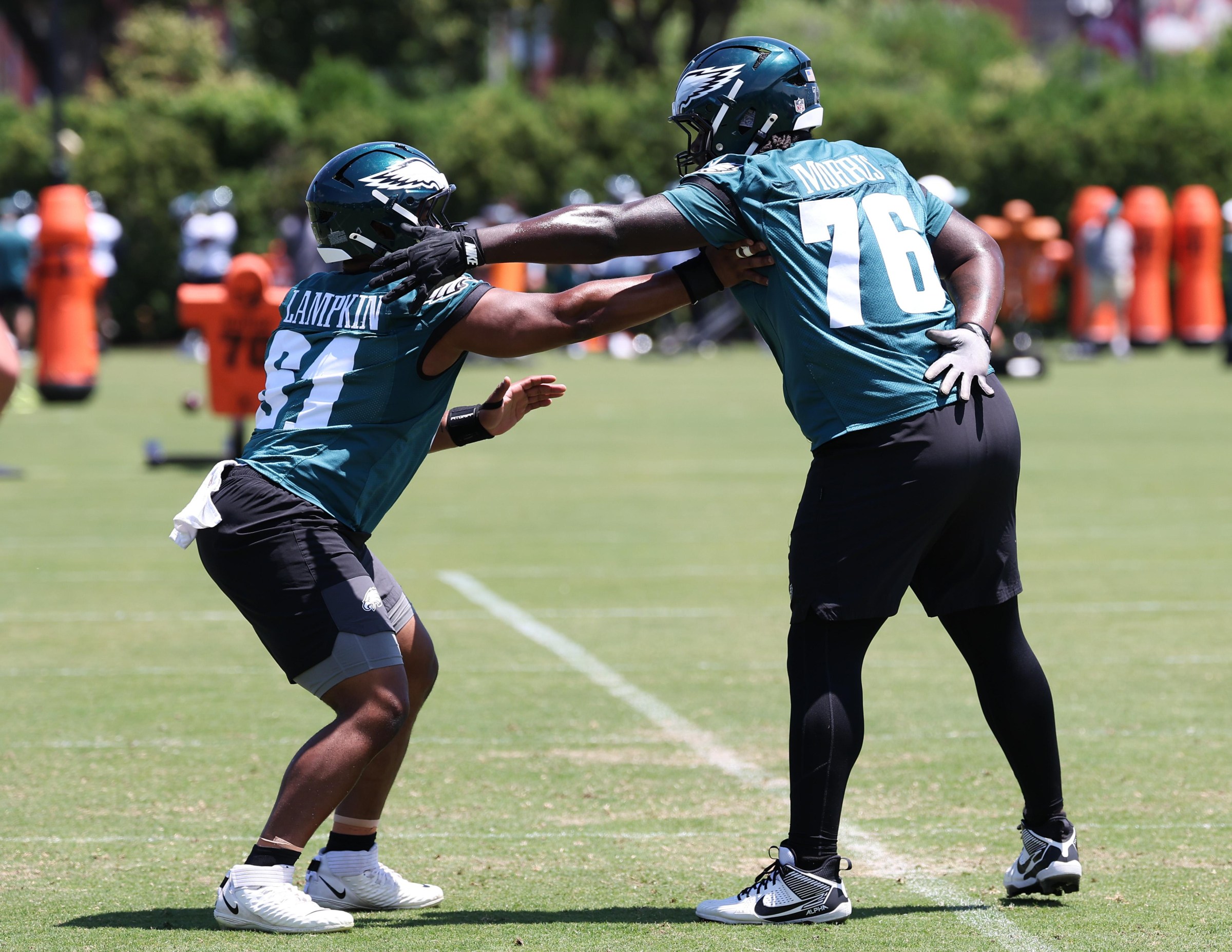 Jun 9, 2026; Philadelphia, PA, USA; Philadelphia Eagles center Willie Lampkin (61) and guard Micah Morris (76) drill during minicamp at Jefferson Health Training Complex. Mandatory Credit: Bill Streicher-Imagn Images