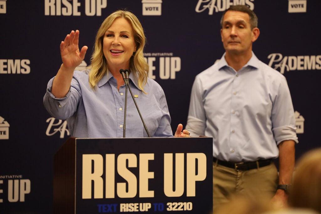 Democratic congressional nominee Janelle Stelson speaks from a podium