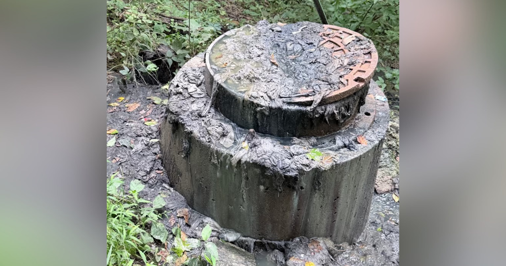 A clogged manhole is stinking up a small Fayette County community, and residents say no one will fix it