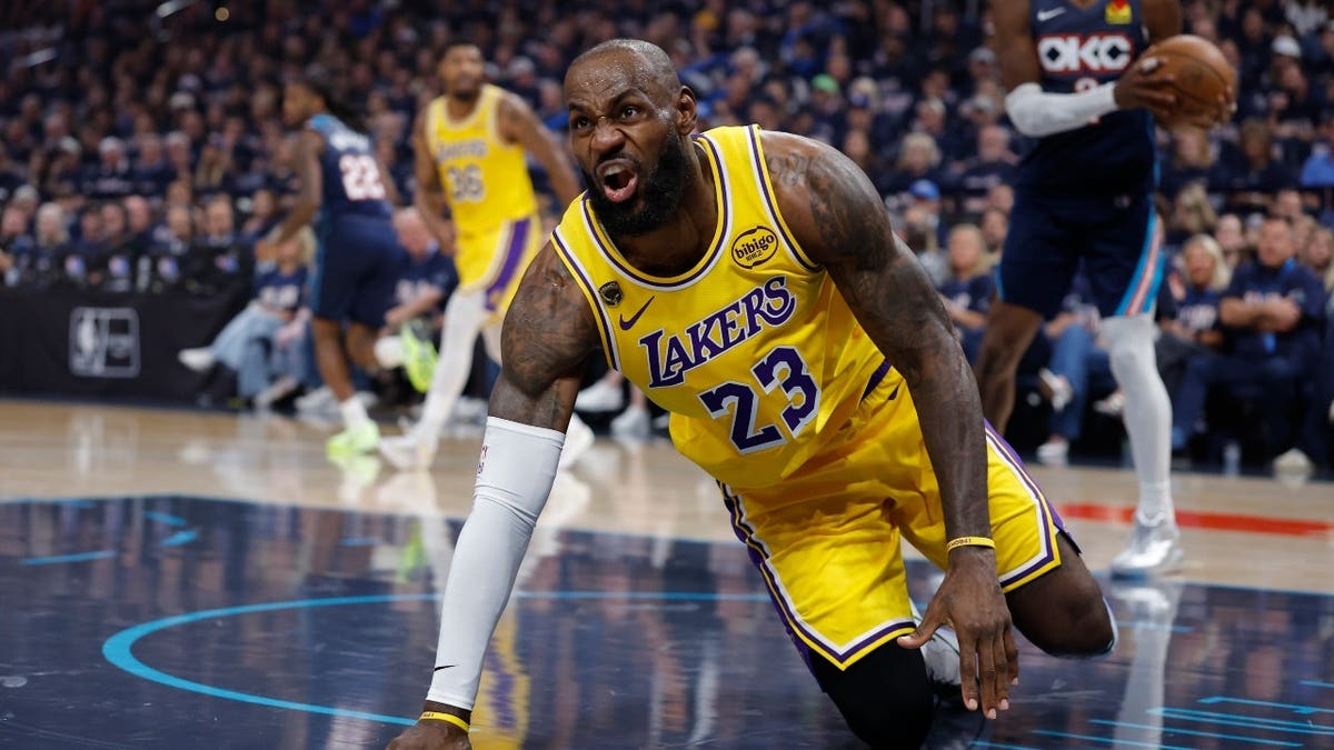 Former Los Angeles Lakers' LeBron James takes a spill vs. the Oklahoma City Thunder during the second round of the 2026 NBA Playoffs at Paycom Center.