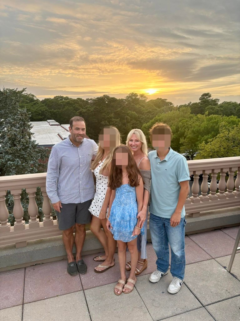 Brian Malloy (far left) pictured with his wife Luiza Malloy (2nd from right) and their children.