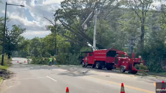 Emergency crews work to remove hazards aid all affected neighborhoods.