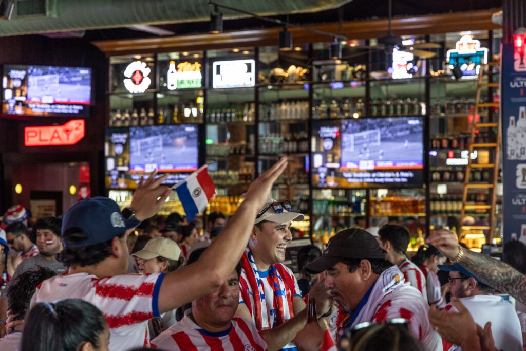 Paraguay fans watch the game at Chickie's and Pete's.