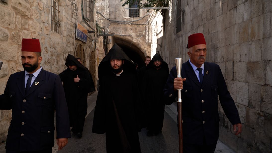 Armenian Christians process through the streets of the Old City, Jerusalem.