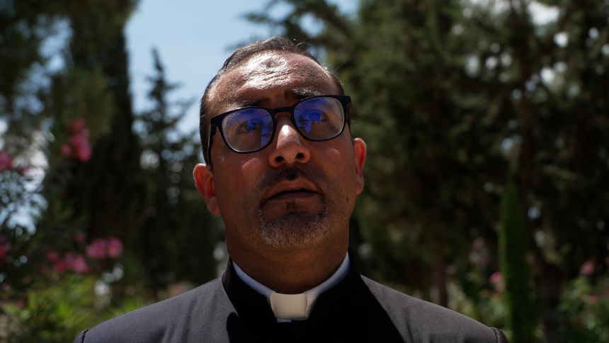Father Bashar Fawadleh has seen many parishioners leave the Christian town of Taybeh.