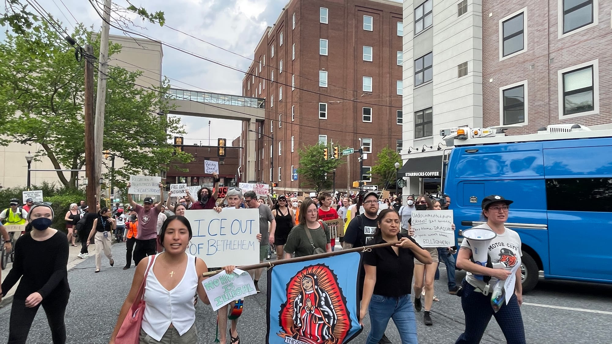 Residents gathered at a rally in Bethlehem on Thursday, June 12 to protest a federal immigration raid at the fire-damaged Fiv