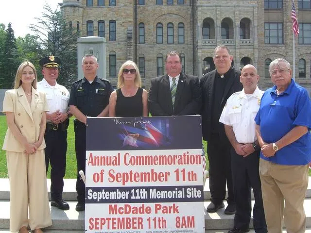 The 9/11 Memorial Committee will mark the 25th anniversary of the Sept. 11, 2001, terrorist attacks on the United States at 8 a.m. Friday, Sept. 11, at the Memorial site in McDade park. Immediately following that commemoration there will be a commemoration of the 250th anniversary of the Declaration of Independence on July 4, 1776. Invited uniformed personnel include the Pennsylvania State Police, EMTs, the Scranton Fire Department bell ceremony, the Civil Air Patrol and the Scouts of America. The Northeast Detachment Marine Corps League will provide the firing detail. From left: Scranton Mayor Paige Cognetti; Chief of Police Tom Carroll; Bruce Beauvais, PA Ambulance; Sheila Shaufler, 911 committee; Pat OMalley, 911 committee; the Rev. Richard Fox, St. Patricks Church; John Judge, fire chief, Scranton; and Charlie Spano, 911 committee.