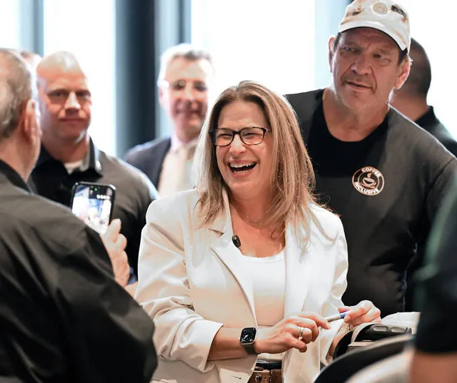 <p>Lori Shapiro, center, the wife of Gov. Josh Shapiro, stands with head baker Julius Zuckerwar, right, on Monday at Coffee Inclusive and Bake Inclusive, Pittston.</p>
<p>Tony Callaio | For Times Leader</p>