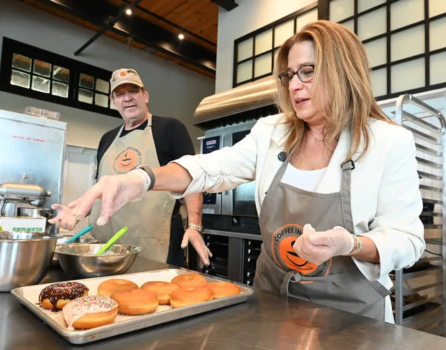 <p>Bake Inclusive’s head baker, Julius Zuckerwar, guides the First Lady of Pennsylvnaia, Lori Shapiro, at Bake Inclusive, one of the few stops she made touring NEPA on Monday.</p>
<p>Tony Callaio | For Times Leader</p>