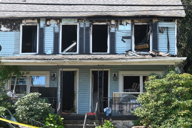 A house on Main St. in Moosic is seen after a fire Thursday, August 6, 2026. (SEAN MCKEAG / STAFF PHOTOGRAPHER)
