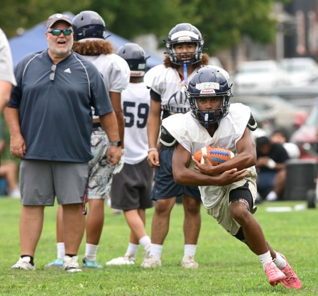 The Dieruff football team led by Coach Dave Lutte holds practice Monday, Aug, 10, 2026, on the opening day of the heat acclimatization period. The Huskies practice well away from the school on North 3rd Street in Allentown. (Monica Cabrera/The Morning Call)