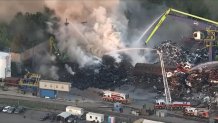 A fire burns at EMR's Camden facility on May 29, 2026.