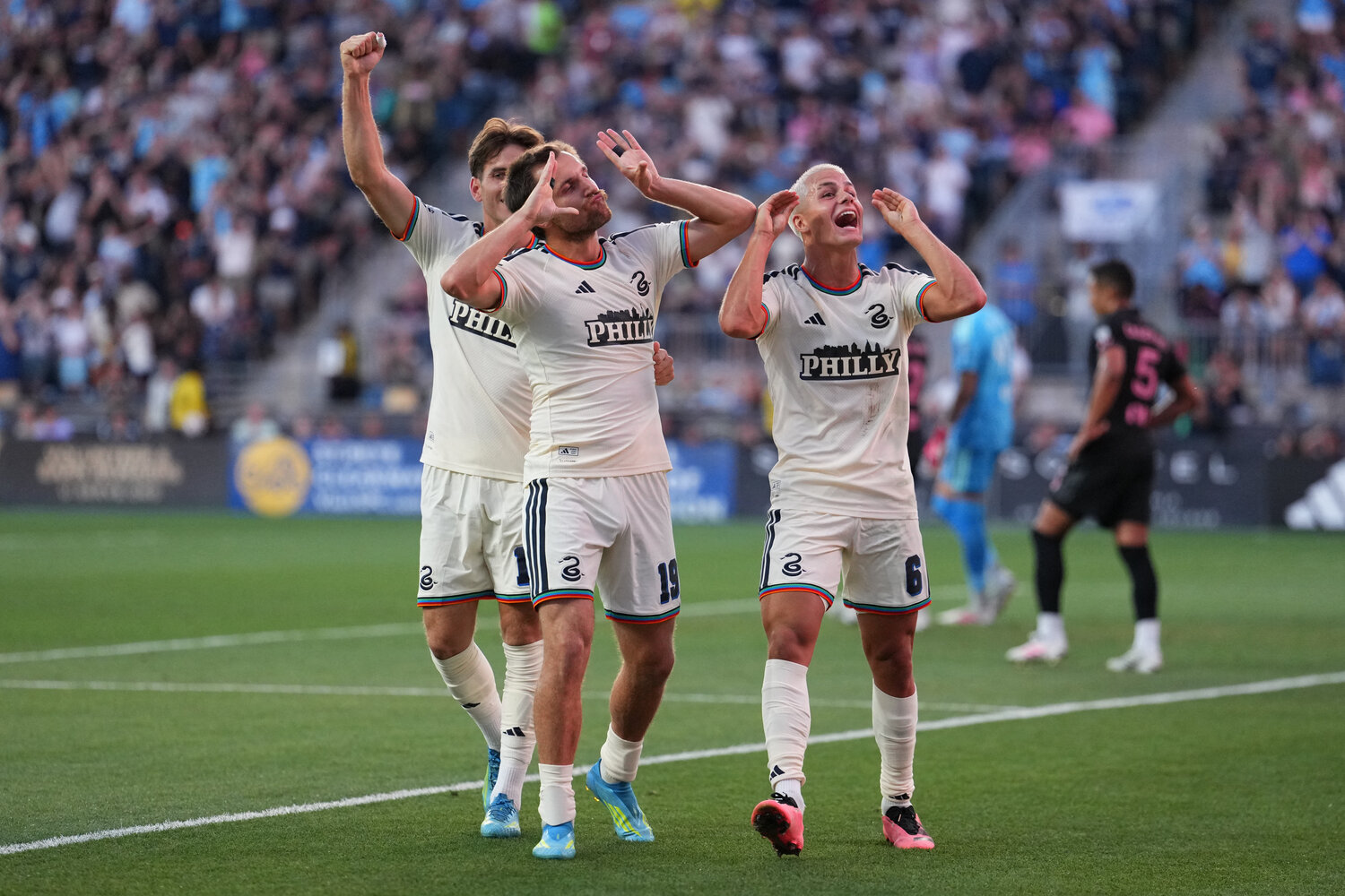 Philadelphia Union midfielder Indiana Vassilev (19) reacts with midfielder Cavan Sullivan (6) and forward Milan Iloski (10) after scoring a goal against Inter Miami CF in the first half at Subaru Park.