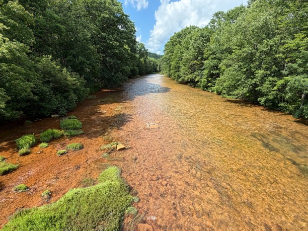 The Moshannon Creek between Centre and Clearfield counties in central Pennsylvania runs yellow with acid mine drainage from abandoned coal mines. (Courtesy of Sally Veach)