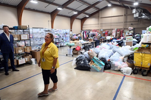 Christine Folk, executive director of Mary's Shelter,300 families a month through a program that provides diapers, food, clothing, household items and other products to struggling families talks about donations to the shelter during a presentation and a tour on Monday, Aug. 24, 2026. (BILL UHRICH/READING EAGLE)