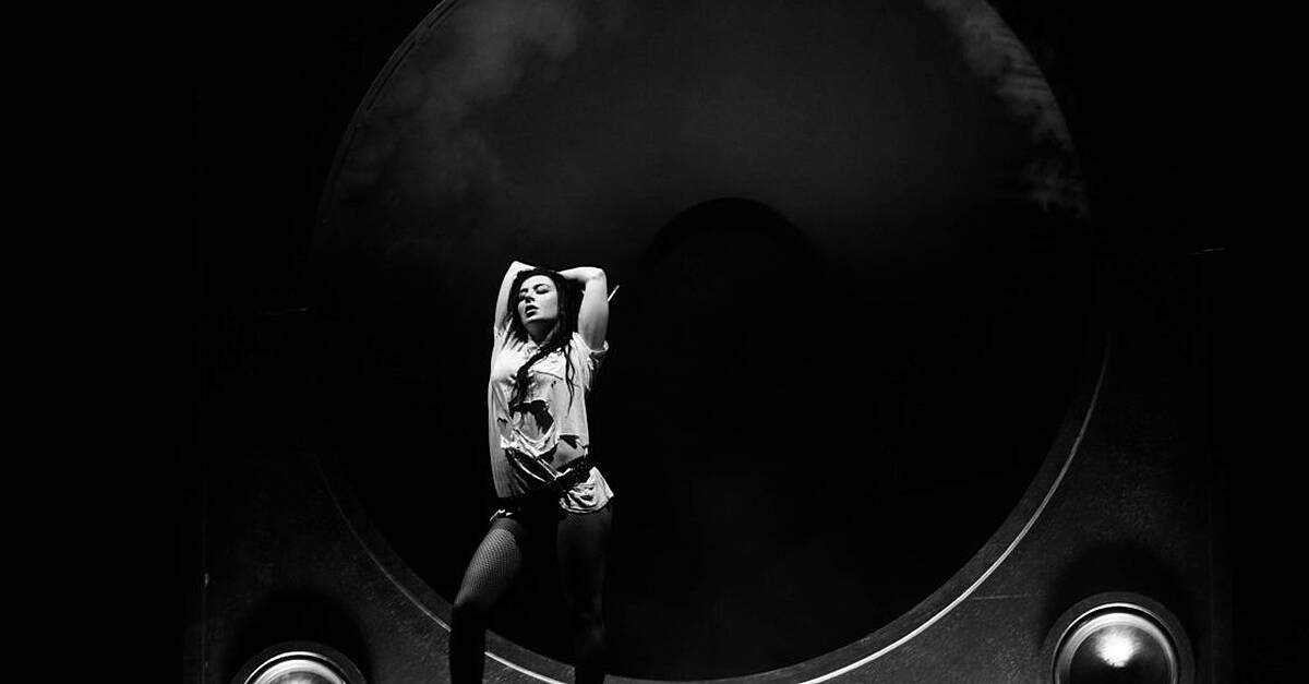 Heavy rain subsides as Charli XCX takes to stage at Reading Festival