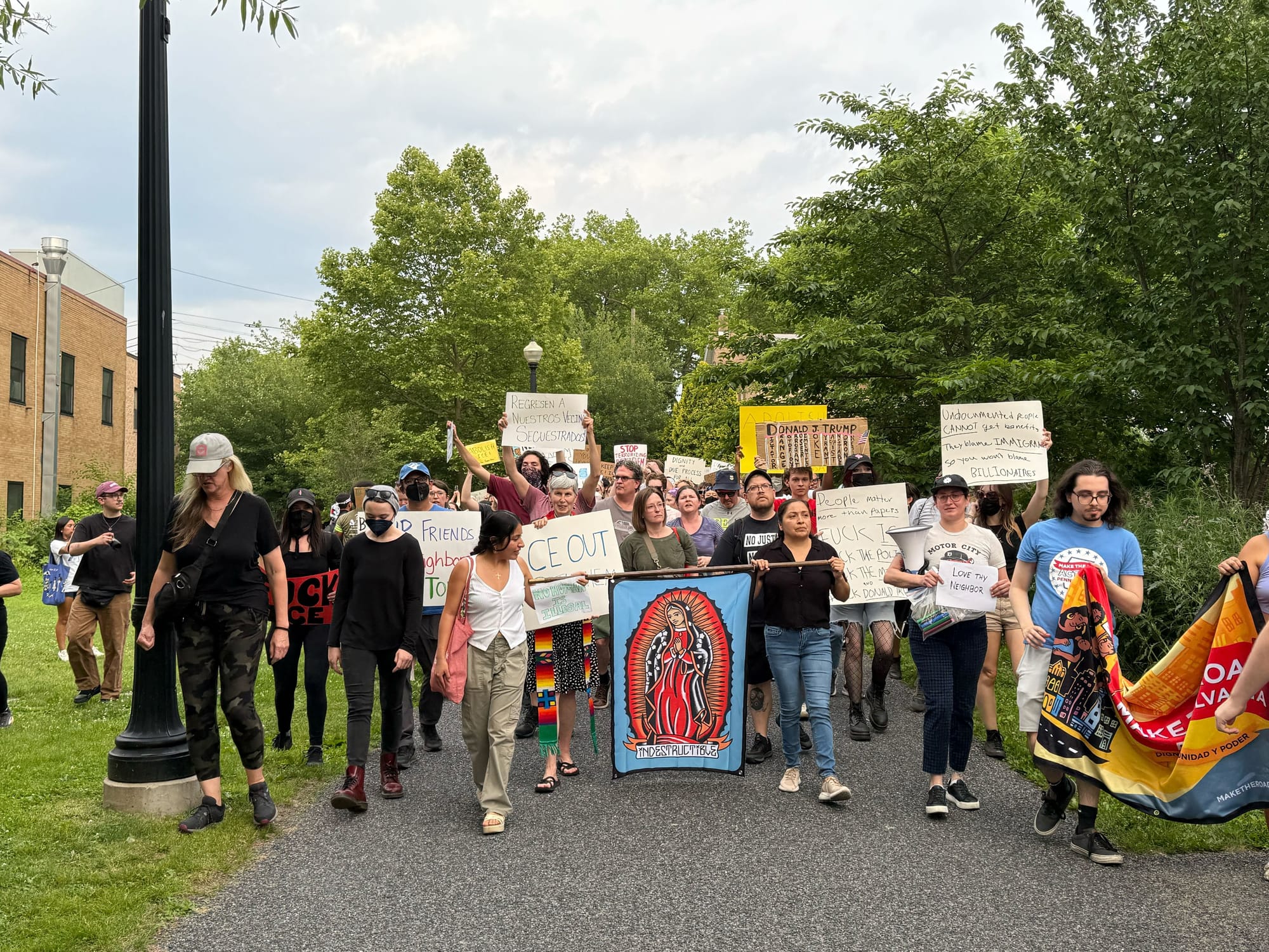 Residents gathered at a rally in Bethlehem on Thursday, June 12 to protest a federal immigration raid at the fire-damaged Fiv