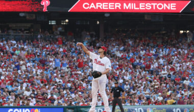 Philadelphia Phillies pitcher Aaron Nola (27) tosses his ball into the dugout after recording his 2000 career strike out during the second inning against the Toronto Blue Jays at Citizens Bank Park.