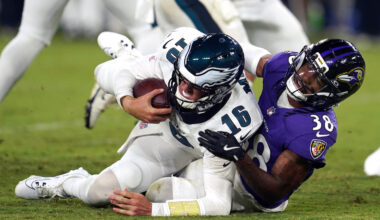 Philadelphia Eagles quarterback Tanner McKee (16) is sacked by Baltimore Ravens cornerback Keyon Martin (38) during the third quarter at M&T Bank Stadium.