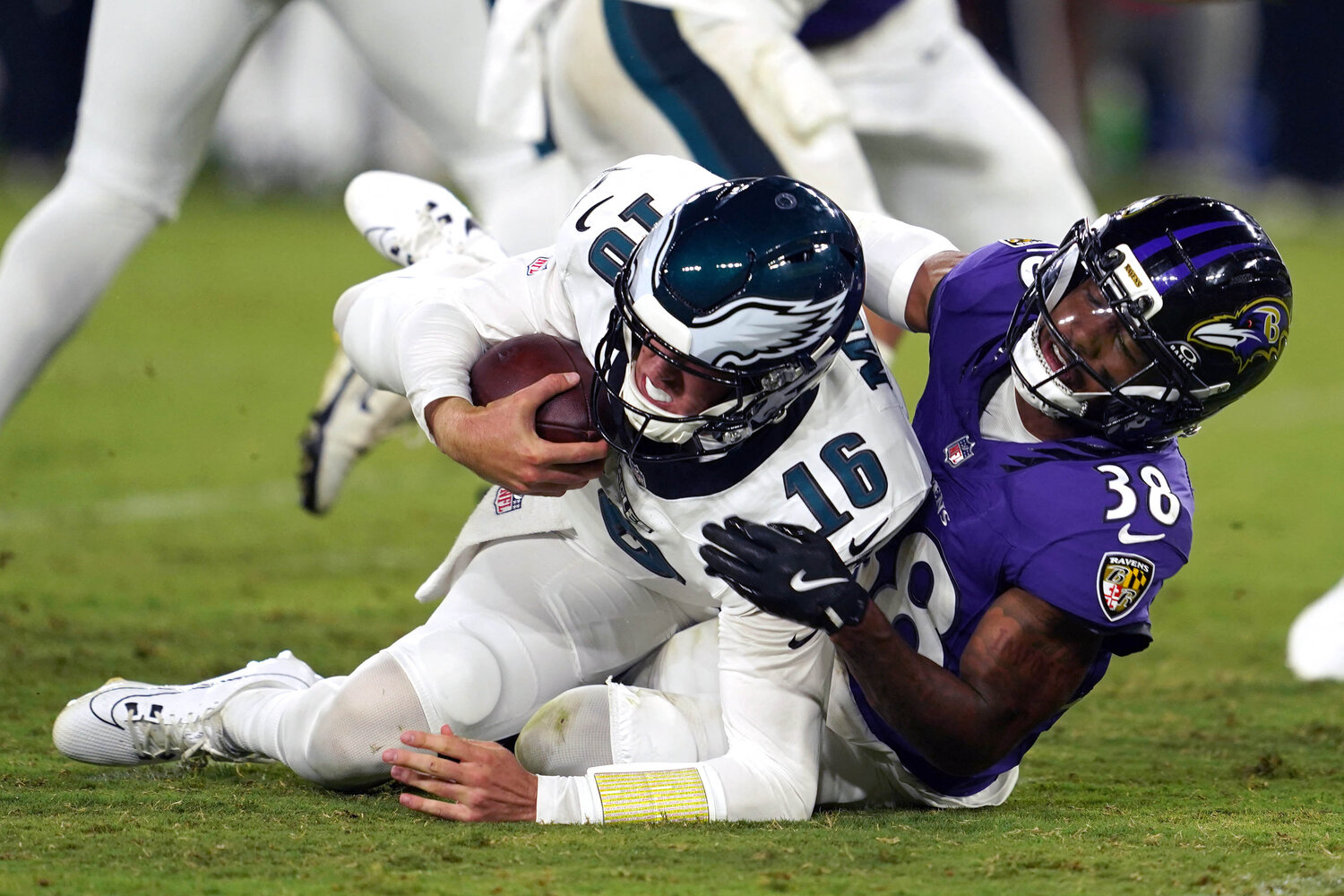Philadelphia Eagles quarterback Tanner McKee (16) is sacked by Baltimore Ravens cornerback Keyon Martin (38) during the third quarter at M&T Bank Stadium.
