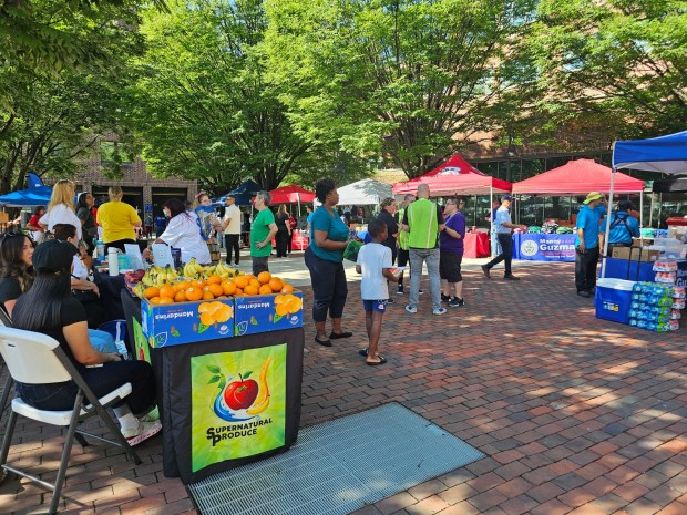More than 800 school children and their families attended the fifth annual Back-to-School Giveaway, hosted by Mayor Eddie Moran and state Rep. Manny Guzman, Wednesday in the 600 block of Penn Street. (MICHELLE LYNCH-READING EAGLE)