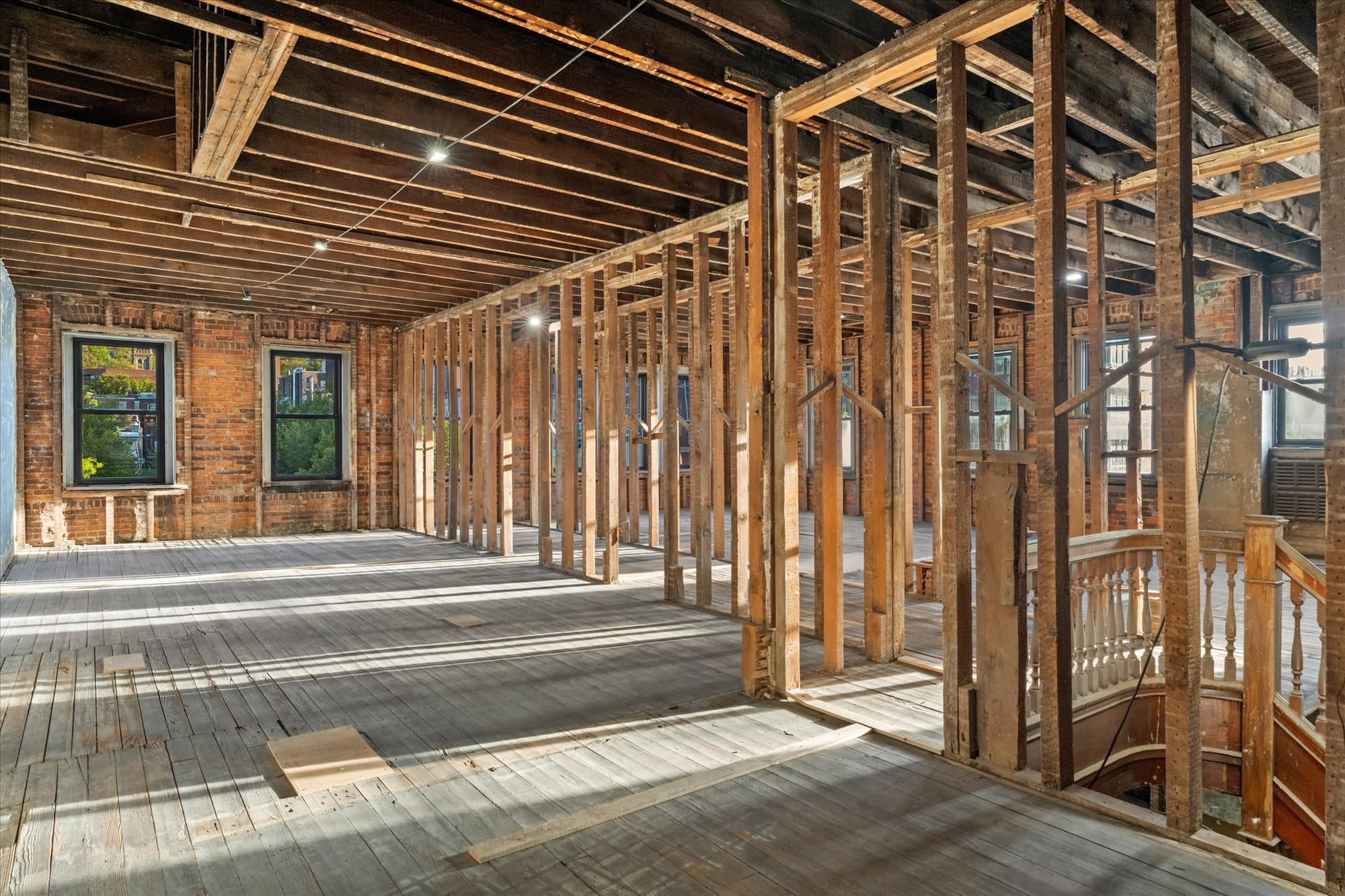 Before and after photos of 'The Emerald on Third,' a mixed-use property now available for sale/lease in the South Side Histor