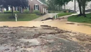 Water rushes down hillside after rain in Cranberry Township, Butler County